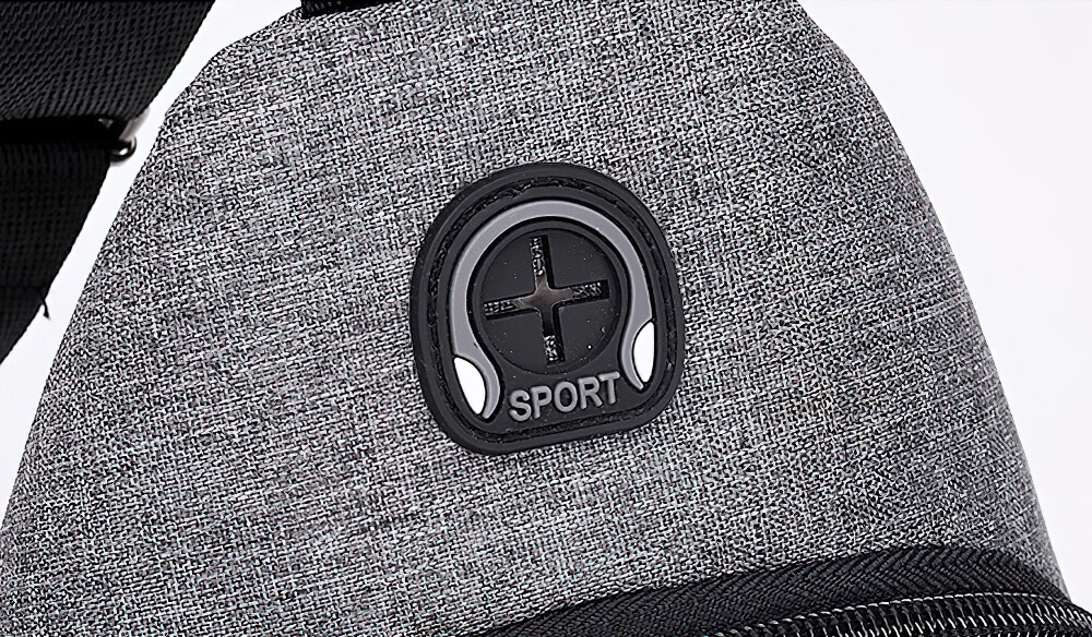 Close-up of a small grey waterproof shoulder strap bag with sporty design for men.